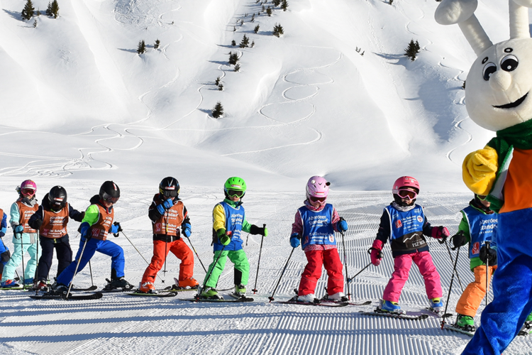 Children's ski course and mascot Snowli of the Klosters Ski School 